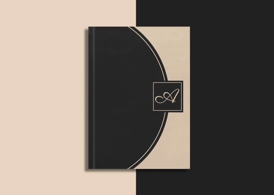 Luxe monogrammed journal on a black/natural background